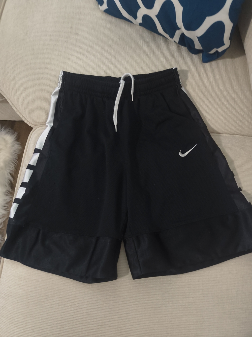 Nike Boys Large Black Athletic Shorts with White Trim and Swoosh
